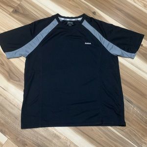 Mens Reebok sport shirt size medium.